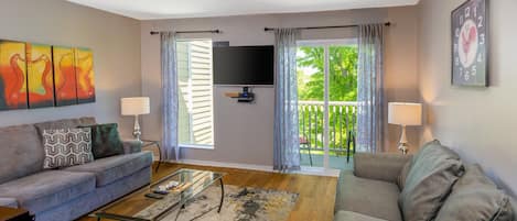 Livingroom with ample seating and TV