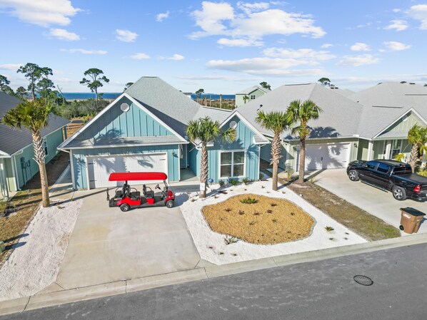 Aerial of Beach Blessing with Golf Cart