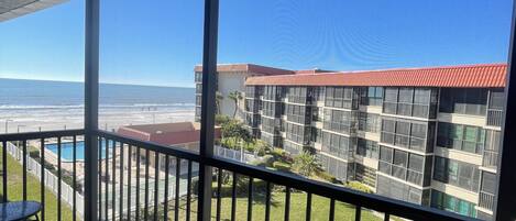 Private screened in patio overlooking the Gulf of Mexico