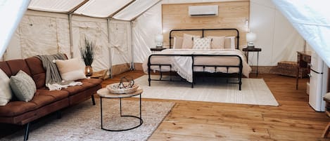 Enjoy 320 sq. ft in our beautifully outfitted treehouse safari tent.