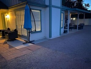 Private courtyard entrance at night