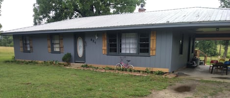 The Rocking J Ranch House has an indoor bathroom with a tub and shower.  