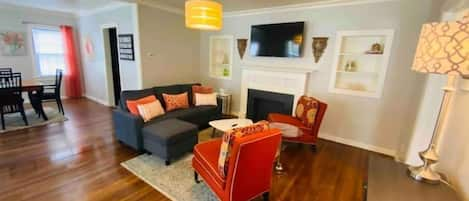 Stylish and comfortable living room with smart TV! Movie night with the family!