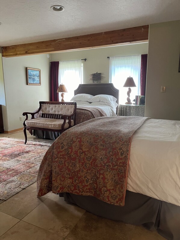 First floor bedroom with 2 queens and a private bath with walk-in shower.  