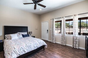 Queen bed in huge bedroom