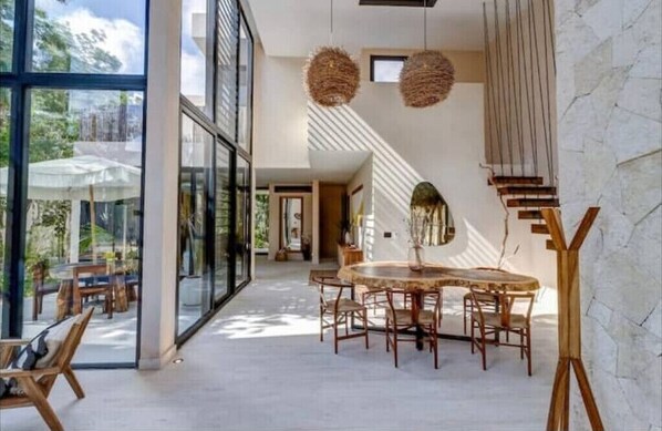 Floor to ceiling windows. lots of light feeling of being outside while inside!