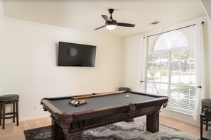 Game on! Pool table and TV.