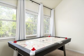 Thrilling air hockey table.