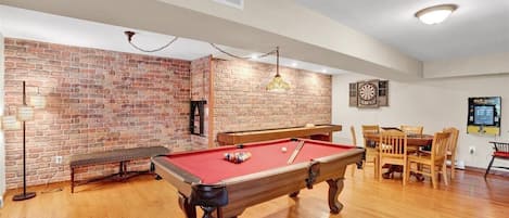 Spacious game room with lots of games. Check listing details for games