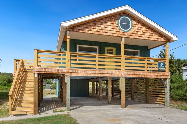 This adorable 3-Bedroom, 2-Bathroom oversized beach box home sits just 600 feet from the beach!
