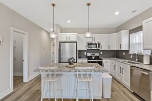 Modern kitchen equipped w/ top-of-the-line appliances