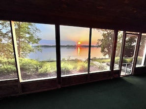 Sunset views from the ground level screen porch.