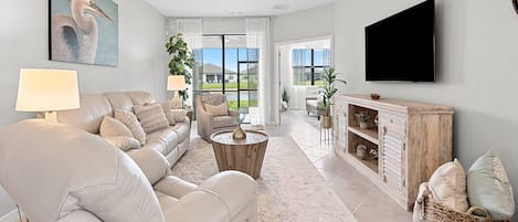 This beautiful home welcomes you with all new designer furniture, a large smart TV, WIFI, and a great view of the pond!  Time to Relax and Unwind!