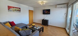 Open plan living room with sea view