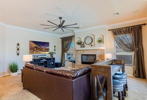 Living Room - Large comfortable sectional couch, behind the couch barstool seating