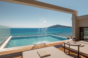 The roof-top infinity pool reigns uniquely at this exquisite holiday home. 