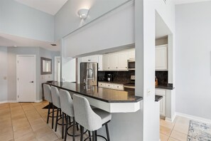 Kitchen with Breakfast Counter at 702 Barrington Park
