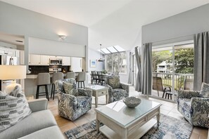 Living Room with Deck Access at 702 Barrington Park