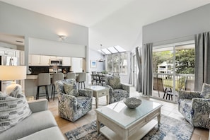 Living Room with Deck Access at 702 Barrington Park