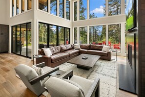 7 Pines Retreat: - Comfortable furnishings around the gas fireplace and 85" smart TV w/sound bar.