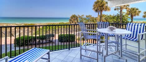 Unobstructed view of the Gulf. High top furniture and lounger