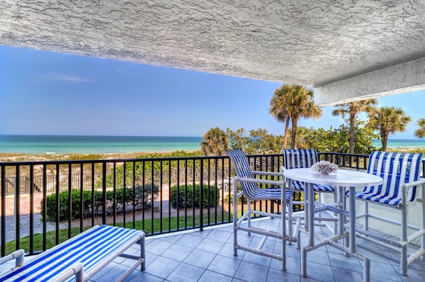 Unobstructed view of the Gulf. High top furniture and lounger