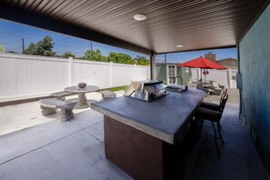 Built in Grill, Sink, and Bar area