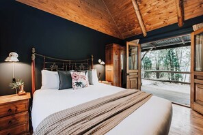 A queen size bedroom with double doors to the veranda provides a nest to recuperate and recharge. 
