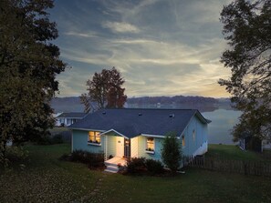 Mckee Cottage is a bright spot on winter's evening.