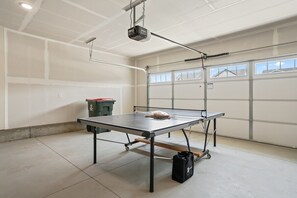 Garage with full sized ping pong table