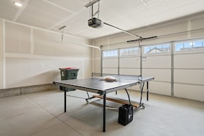 Garage with full sized ping pong table
