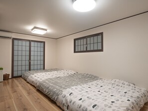 A spacious and relaxing bedroom with 4 semi-double beds!