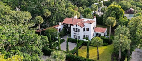 Aerial view of this gorgeous, historic cottage and the stunning grounds 