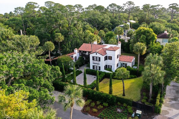 Aerial view of this gorgeous, historic cottage and the stunning grounds 