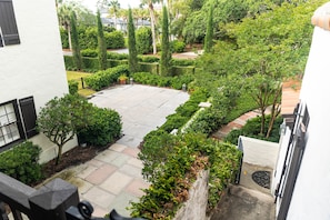 Stunning view of the courtyard and gardens from the upstairs balcony.