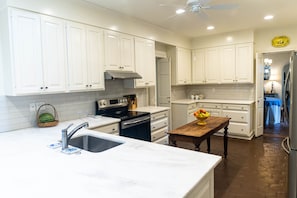 Recently renovated, beautiful kitchen with marble counters and updated appliance