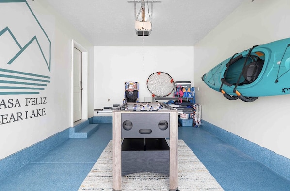 Unwind from your day at the beach in the game room (previously the garage).
