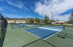 Across the street from the community are pickleball courts. We provide 8 paddles