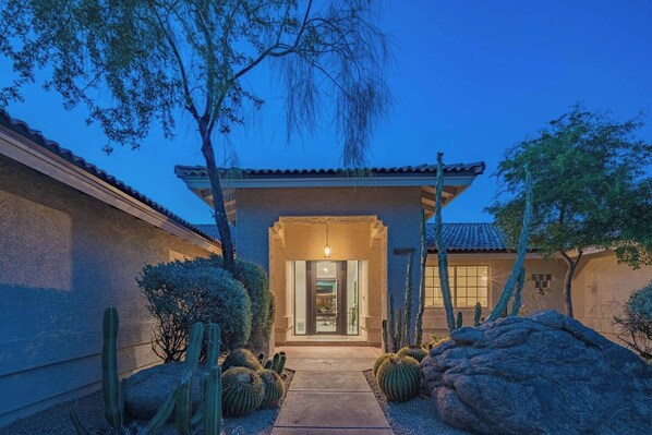 Front entrance w/night time view