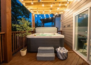 Indulge in ultimate relaxation in our private hot tub, providing a serene oasis to melt away the stress of everyday life.