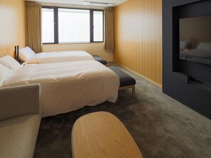 ・[Deluxe twin example] Our guests are pleased with the comfort of the bed as if they were enveloping us.