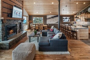 Great room with large windows and a fabulous kitchen.