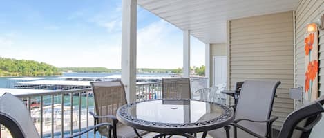 Take in the breathtaking views and the breeze of fresh air from the screened in patio.