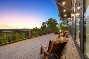 Take in the panoramic views on the high upper deck off the kitchen/family room.