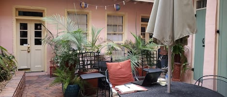 Quaint, traditional, French Quarter courtyard, shared with only 2 other units.  