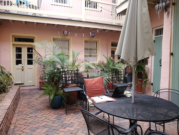 Quaint, traditional, French Quarter courtyard, shared with only 2 other units.  