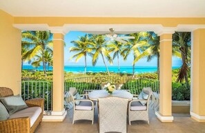 Covered outdoor elevated patio with plenty of seating