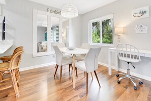 Sunlit dining room: versatile with abundant windows for a delightful experience