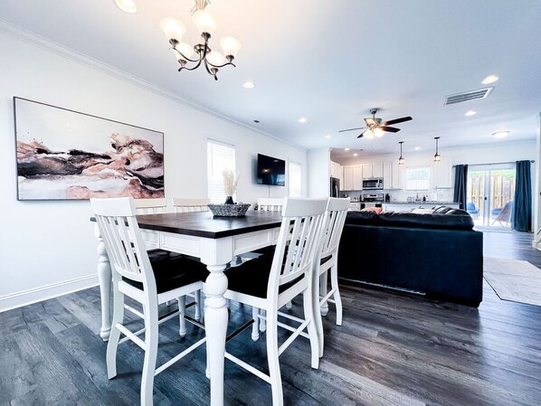 Dining table and living area from front door view