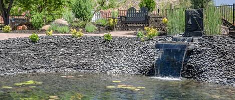 Take in the Calming Waterfall into the Private Pond